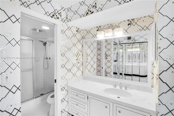 a bathroom with a shower and a shower curtain
