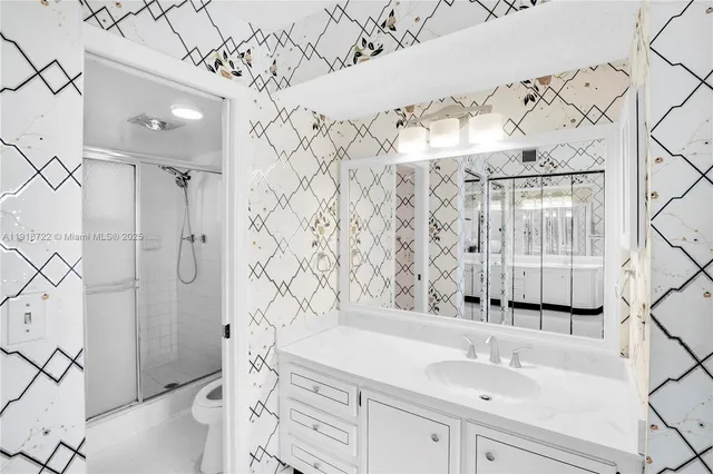 a bathroom with a shower and a shower curtain
