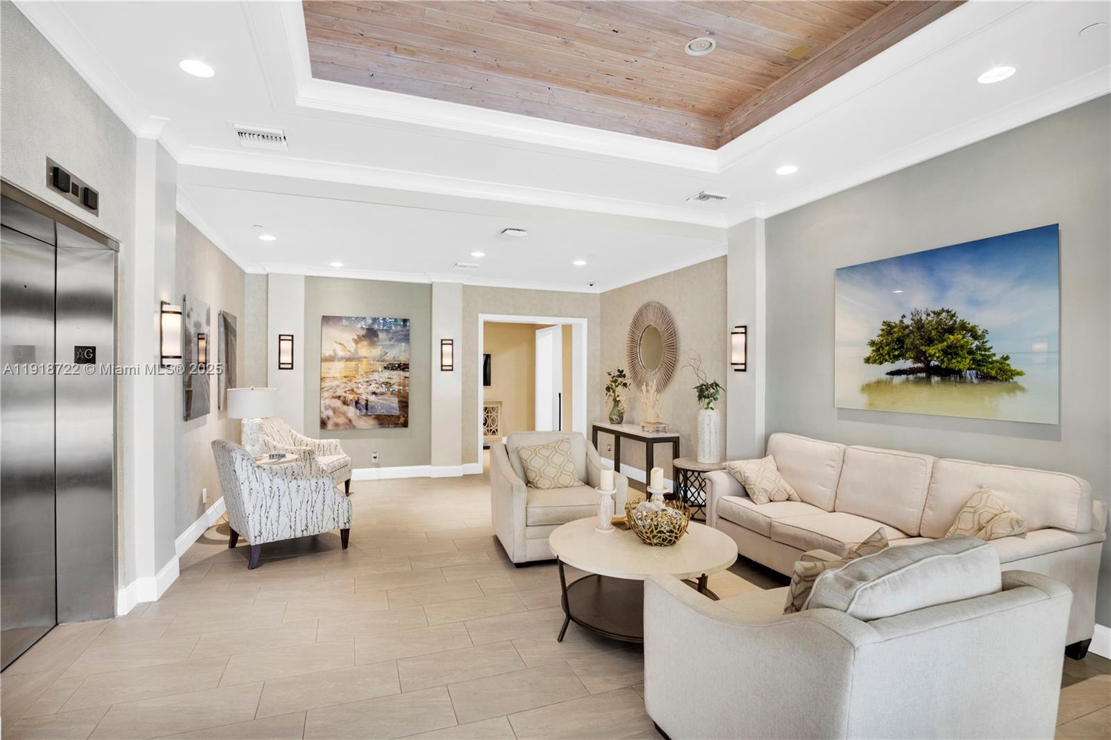 200 Ocean Trail Way, Unit 609 Jupiter, FL 33477 - Photo 21 of 27 a living room with furniture and a large window