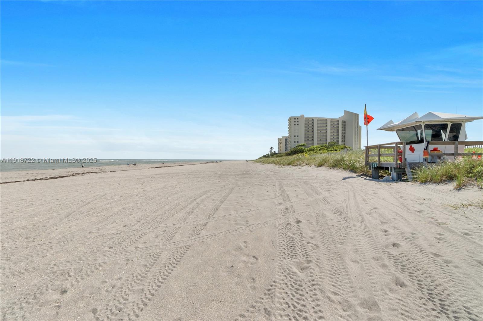 200 Ocean Trail Way, Unit 609 Jupiter, FL 33477 - Photo 24 of 27 a view of a lake with a building in the background
