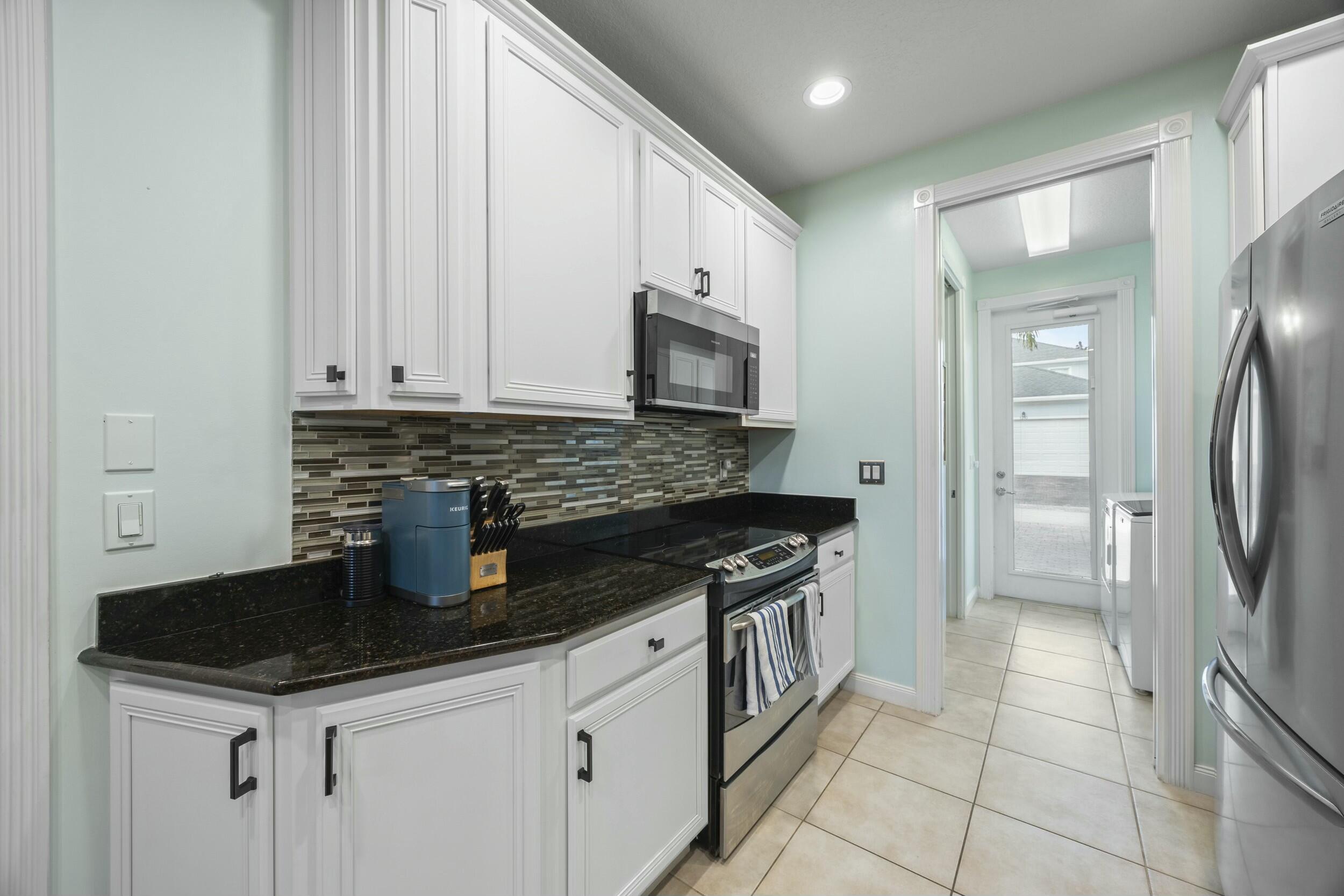 1311 North Jeaga Drive Jupiter, FL 33458 - Photo 11 of 39 tempImagegqxtM1