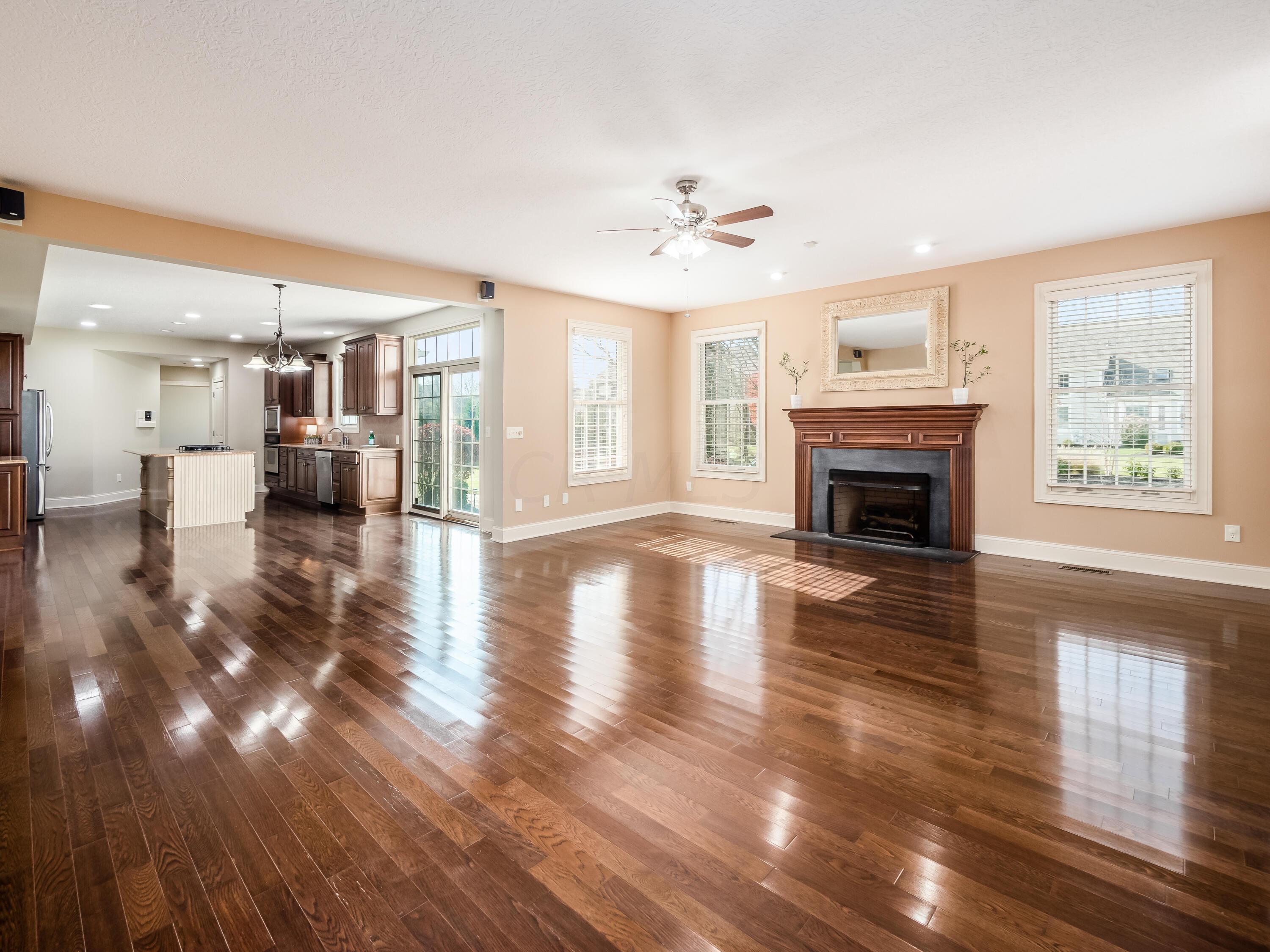 5949 Dunheath Loop Dublin, OH 43016 - Photo 13 of 57 Family Room open to Kitchen