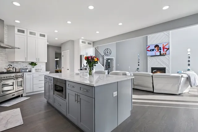 a kitchen with counter top space and stove