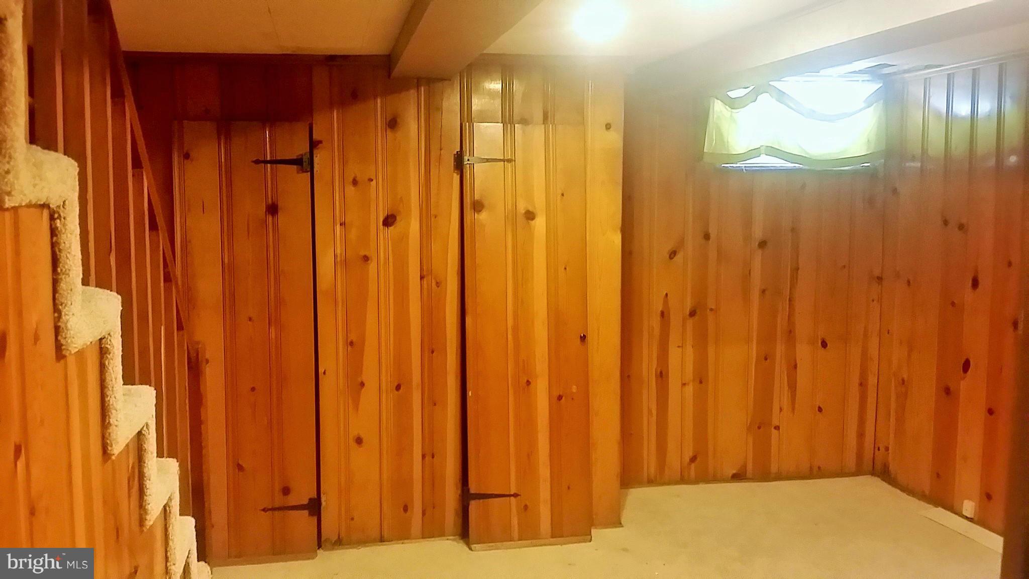 6939 Glenheights Road Baltimore, MD 21215 - Photo 19 of 21 a bathroom with a shower curtain