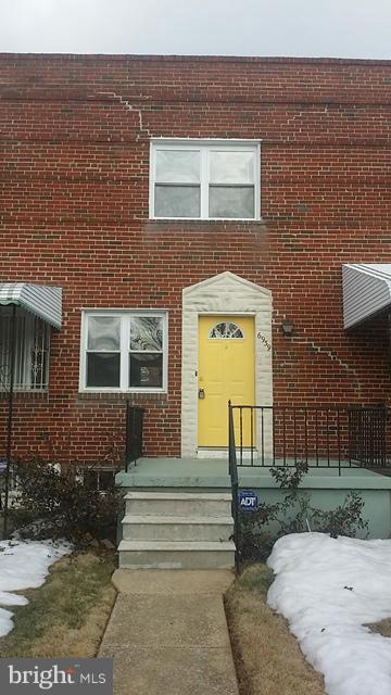 6939 Glenheights Road Baltimore, MD 21215 - Photo 21 of 21 a front view of a house with a yard