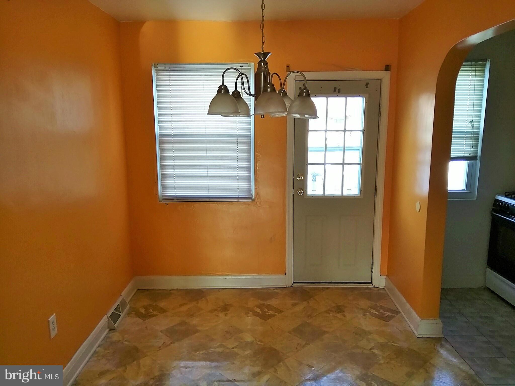 6939 Glenheights Road Baltimore, MD 21215 - Photo 4 of 21 a view of a livingroom with a window