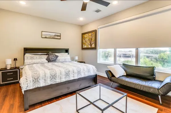 a view of a patio with a table and chairs