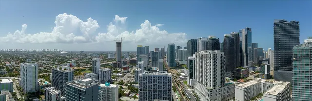 a view of a city with tall buildings