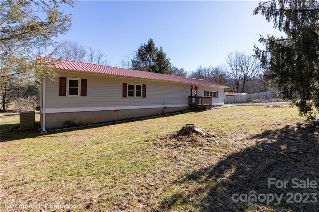 8 Ross Farm Road Waynesville, NC 28786 - Photo 1 of 23 a view of the house with snow on the road