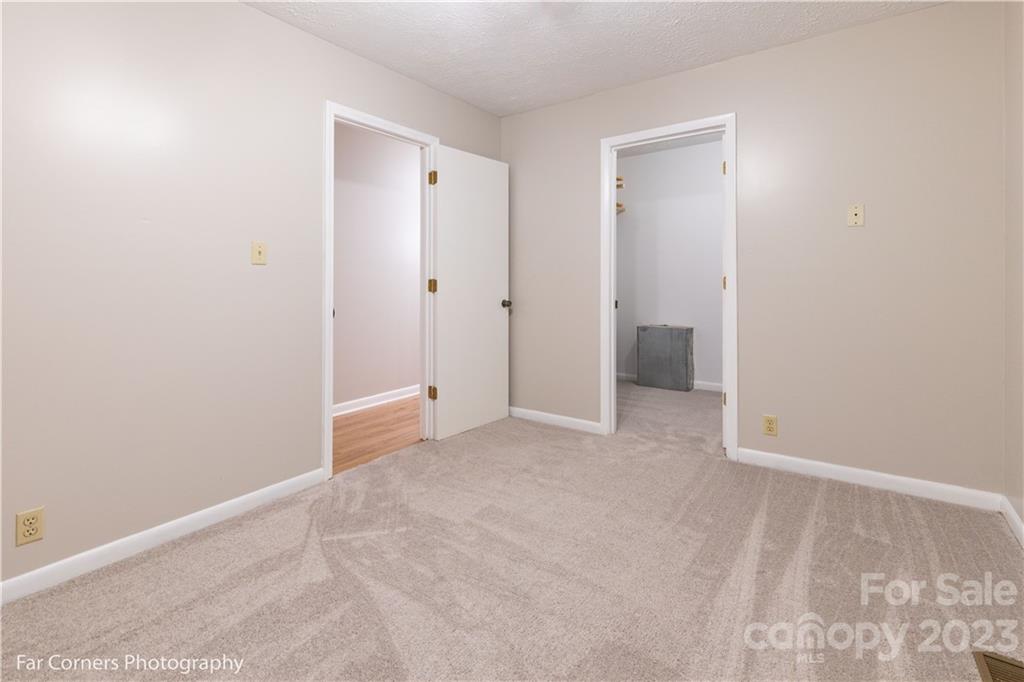 8 Ross Farm Road Waynesville, NC 28786 - Photo 14 of 23 a view of an empty room