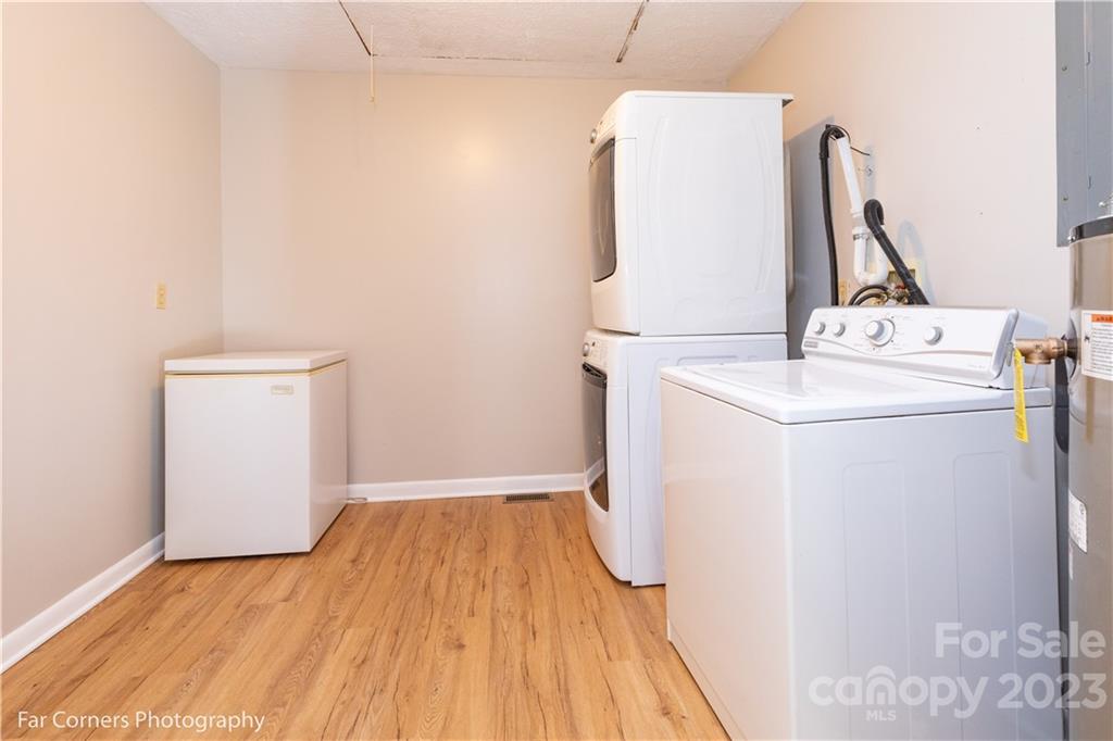 8 Ross Farm Road Waynesville, NC 28786 - Photo 17 of 23 a view of a storage & utility room with a washer dryer