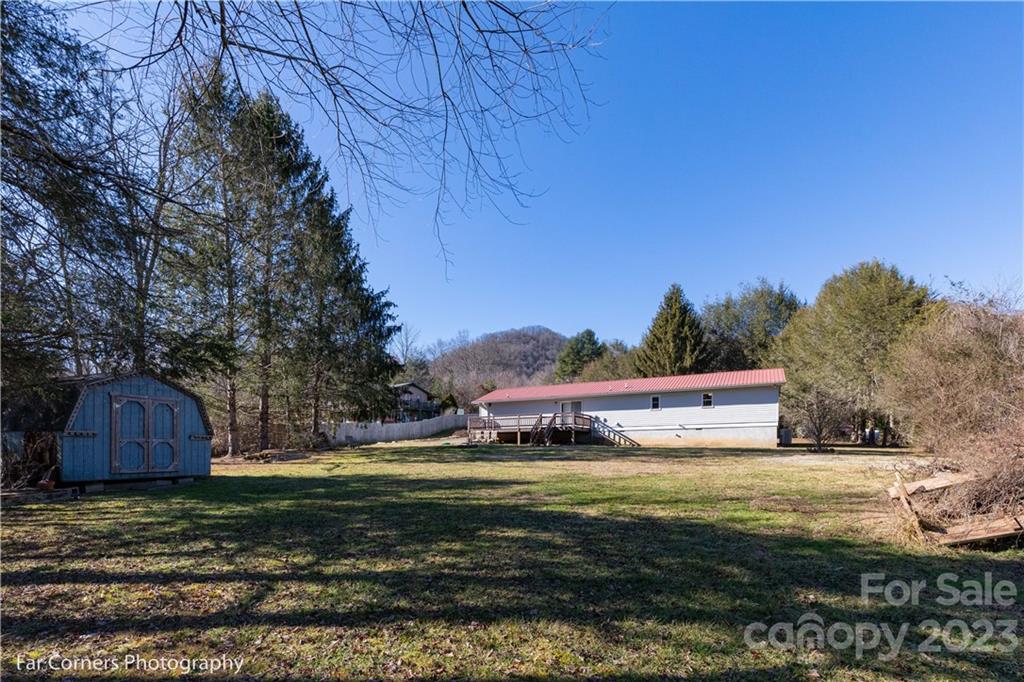 8 Ross Farm Road Waynesville, NC 28786 - Photo 18 of 23 a view of a house with a yard