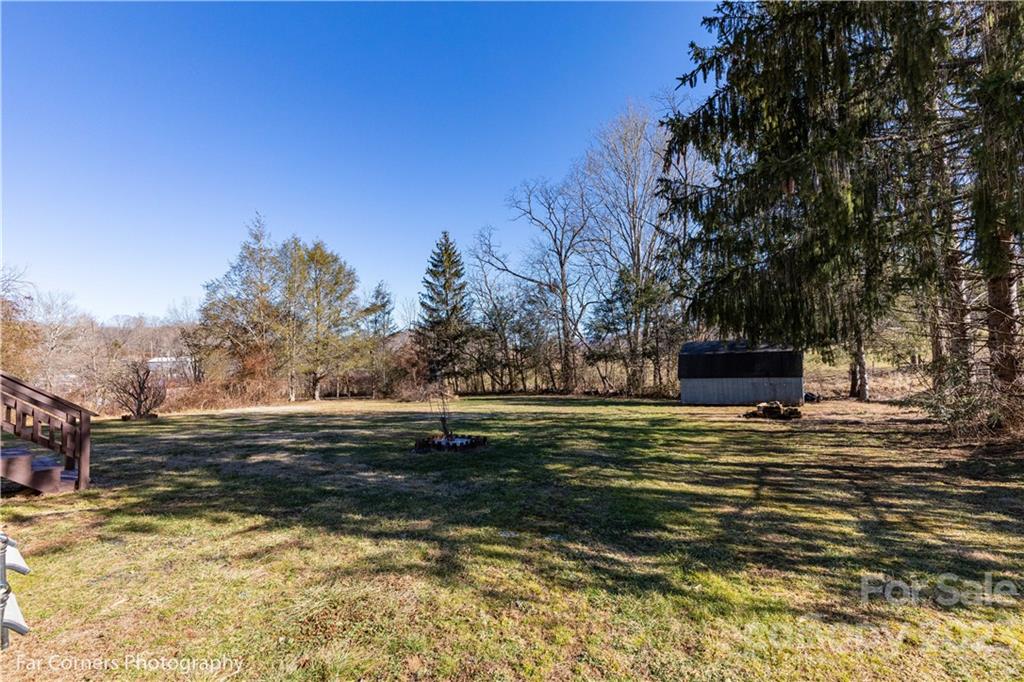 8 Ross Farm Road Waynesville, NC 28786 - Photo 20 of 23 a view of a yard with a house