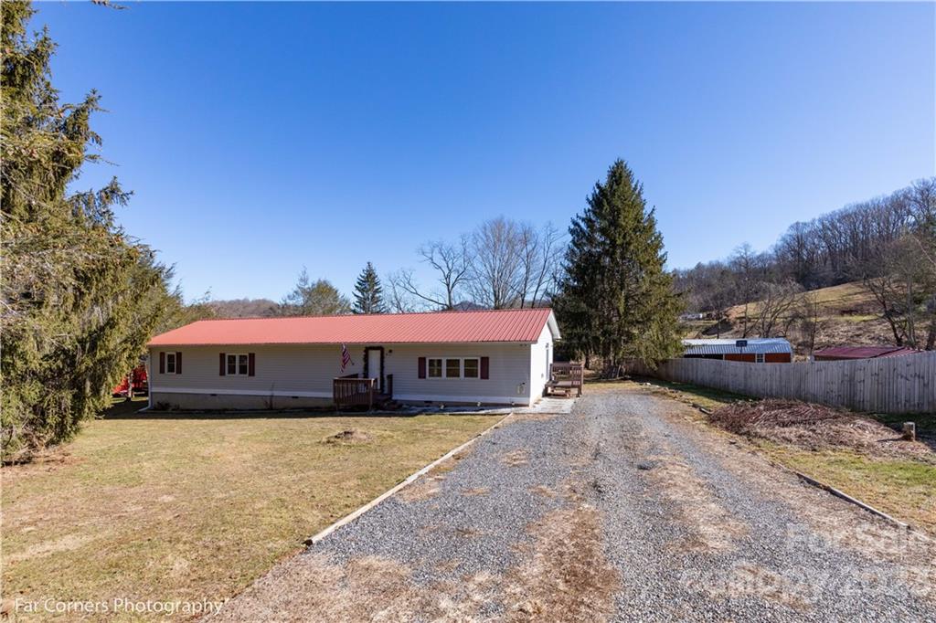 8 Ross Farm Road Waynesville, NC 28786 - Photo 2 of 23 a view of swimming pool with trees in the background