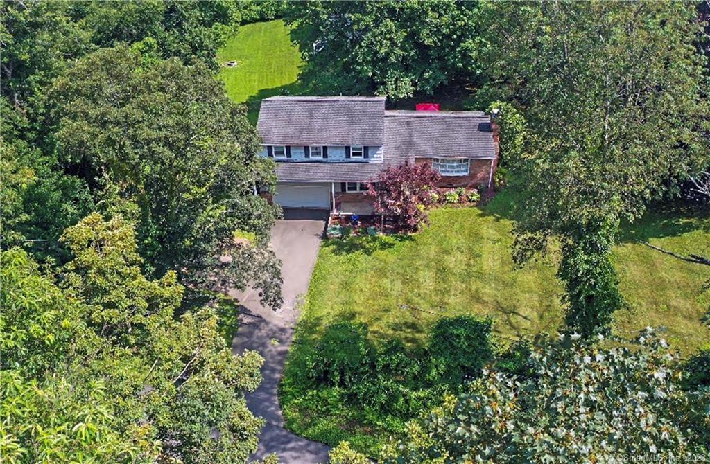 28 Schoolhouse Hill Road Newtown, CT 06470 - Photo 1 of 1 an aerial view of a house with a garden and trees