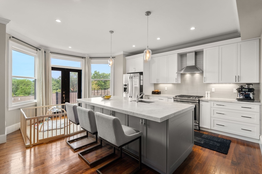 324 Tappan Street, Unit 2 Brookline, MA 02445 - Photo 2 of 19 a kitchen with counter space sink and appliances