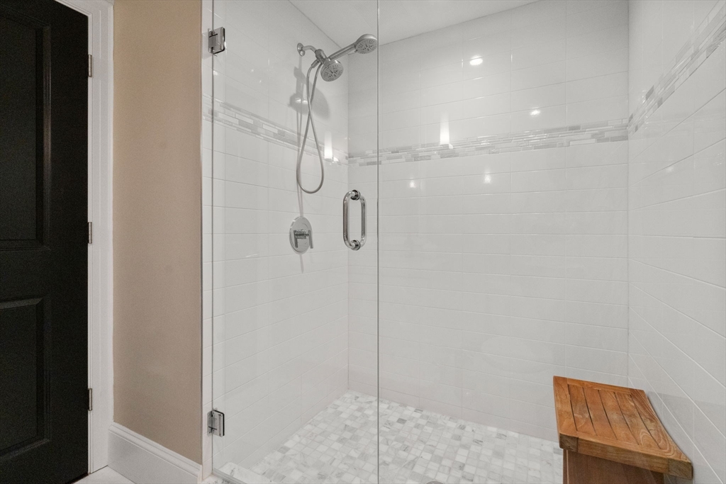 324 Tappan Street, Unit 2 Brookline, MA 02445 - Photo 9 of 19 a bathroom with a shower