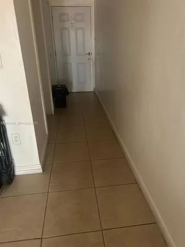 a view of a utility room with a sink