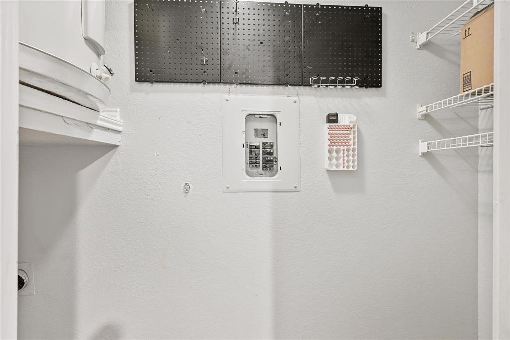 12660 Hillcrest Road, Unit 7103 Dallas, TX 75230 - Photo 14 of 14 a bathroom with a sink and a mirror