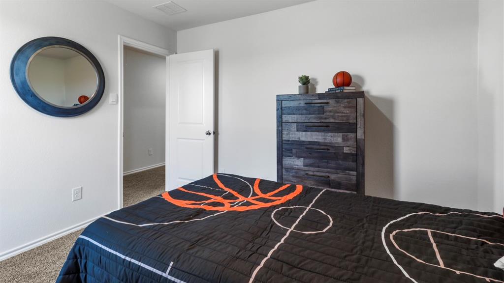 636 Dunham Road Nevada, TX 75173 - Photo 11 of 31 Carpeted room featuring white walls and a white two-panel interior door