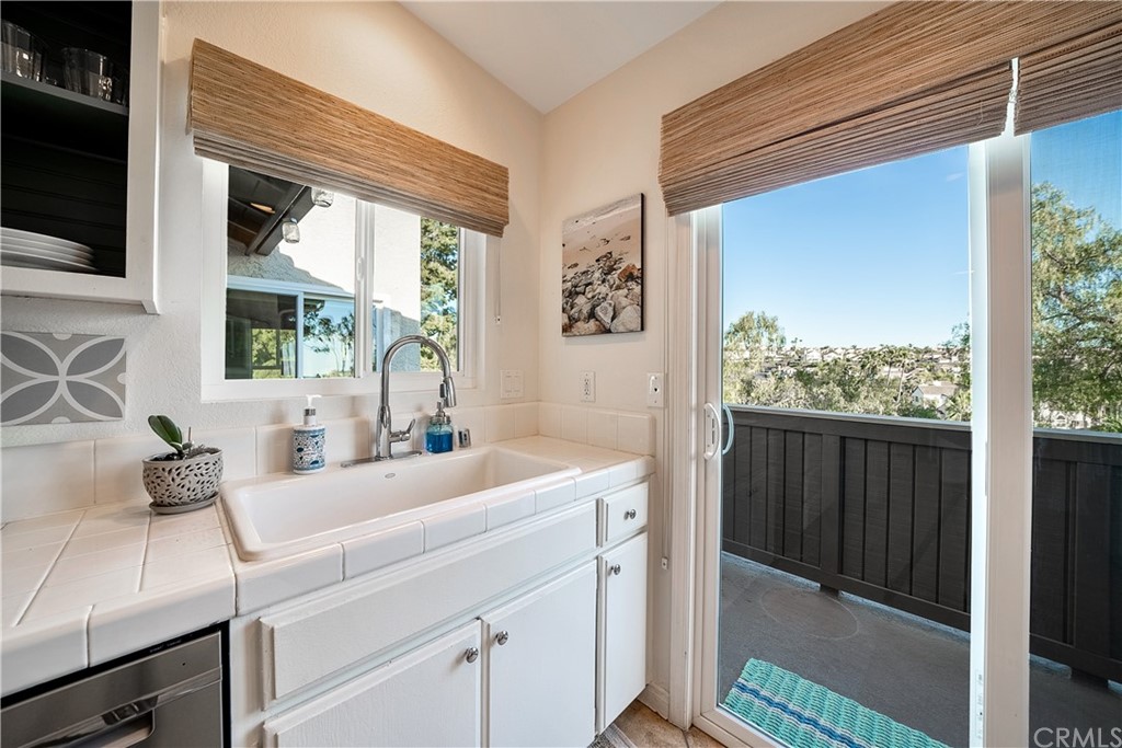 26 Corniche Drive, Unit F Dana Point, CA 92629 - Photo 16 of 46 Kitchen with a view