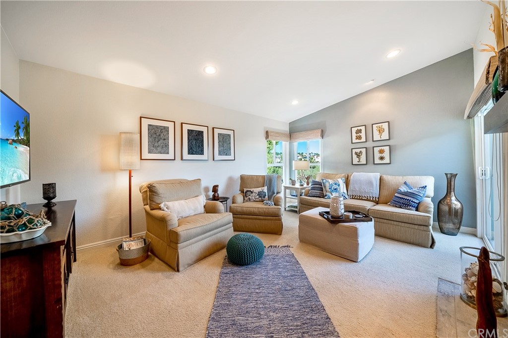 26 Corniche Drive, Unit F Dana Point, CA 92629 - Photo 3 of 46 a living room with furniture and a couch