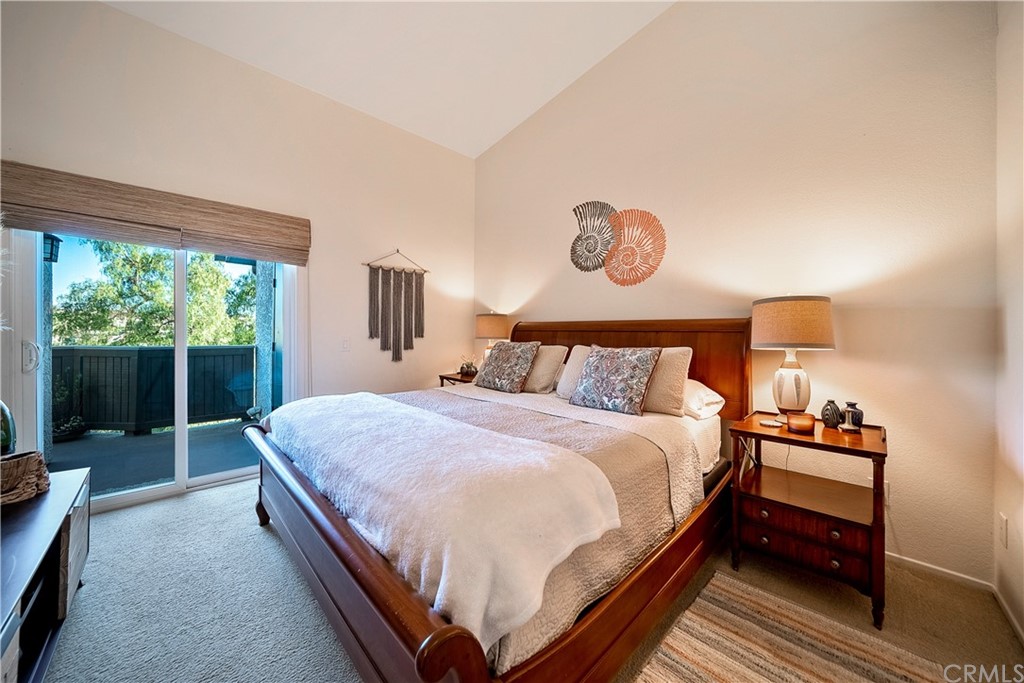26 Corniche Drive, Unit F Dana Point, CA 92629 - Photo 31 of 46 a bedroom with a bed and a window