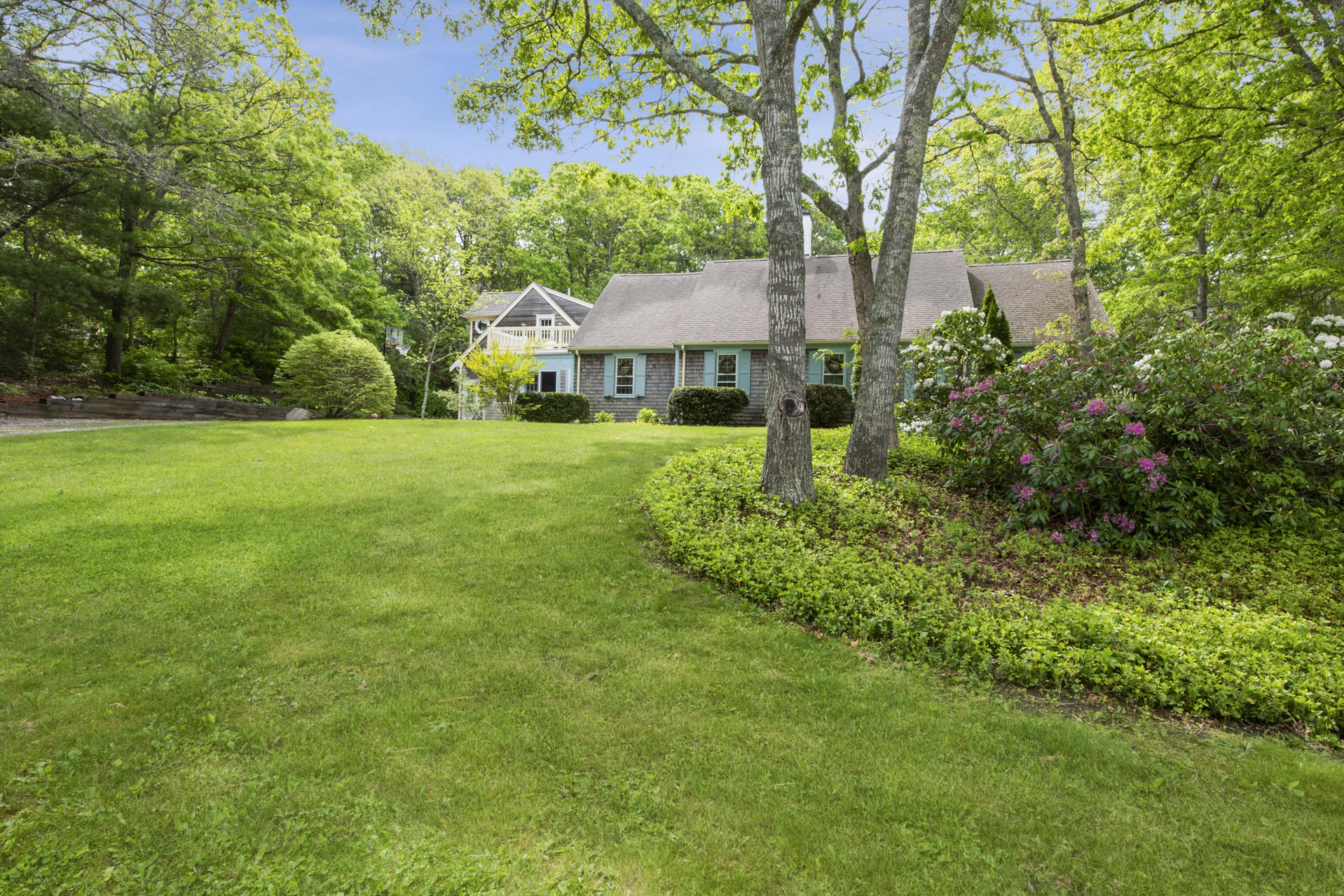 13 Country Farm Road Forestdale, MA 02644 - Photo 3 of 39 a view of a big yard next to a house