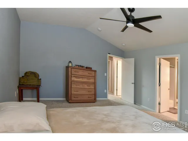 a view of room with a ceiling fan