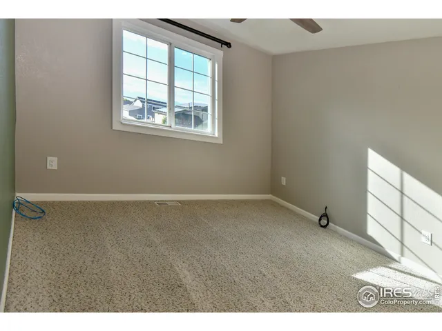 a view of a room that has a window in it