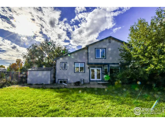 a view of a house with a garden