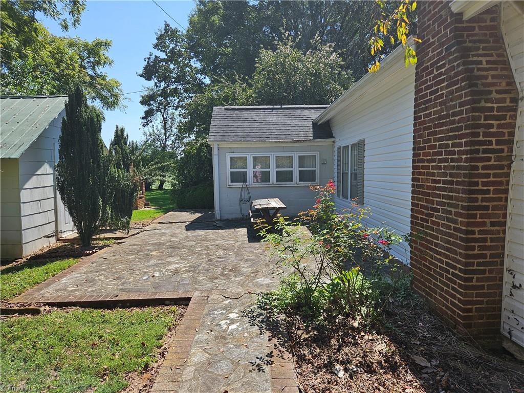 777 Copeland School Road Dobson, NC 27017 - Photo 6 of 43 Back Slate Patio