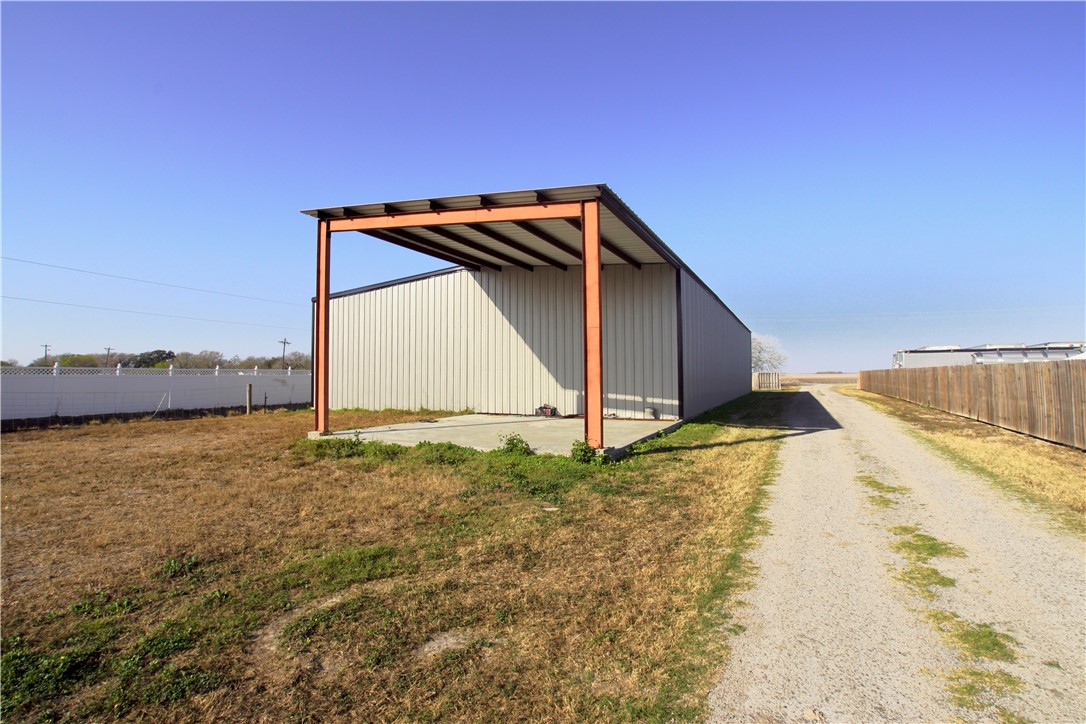 a house with trees in the background