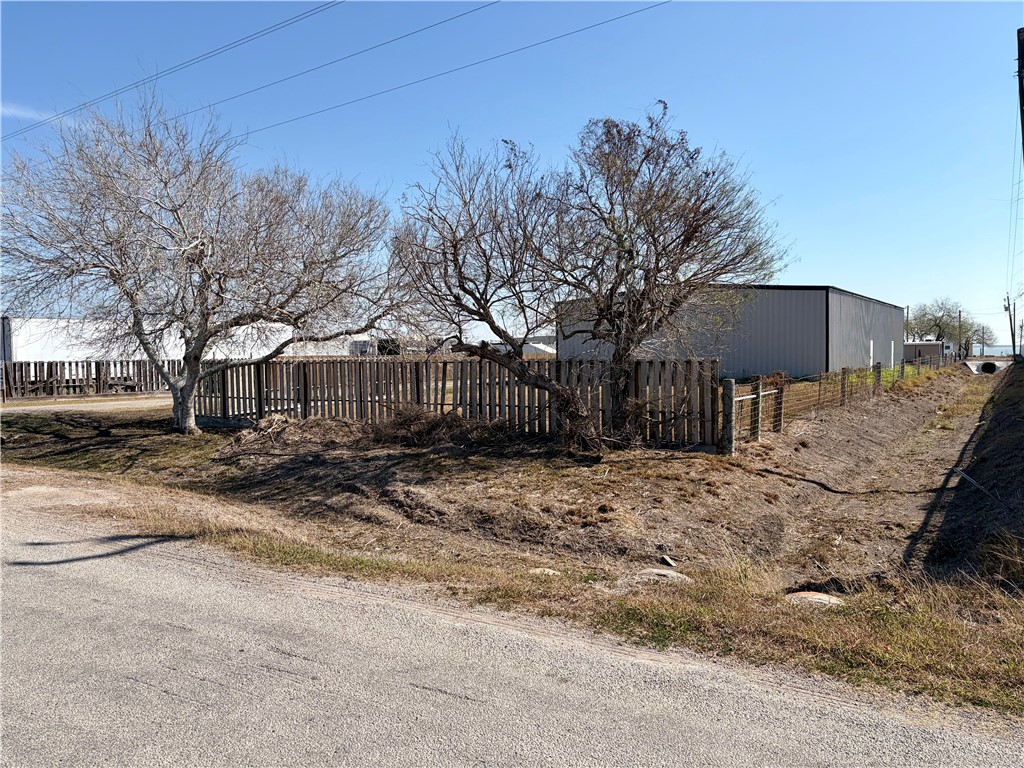 Undisclosed Address Riviera, TX 78379 - Photo 13 of 16 a view of a house with a yard covered in snow