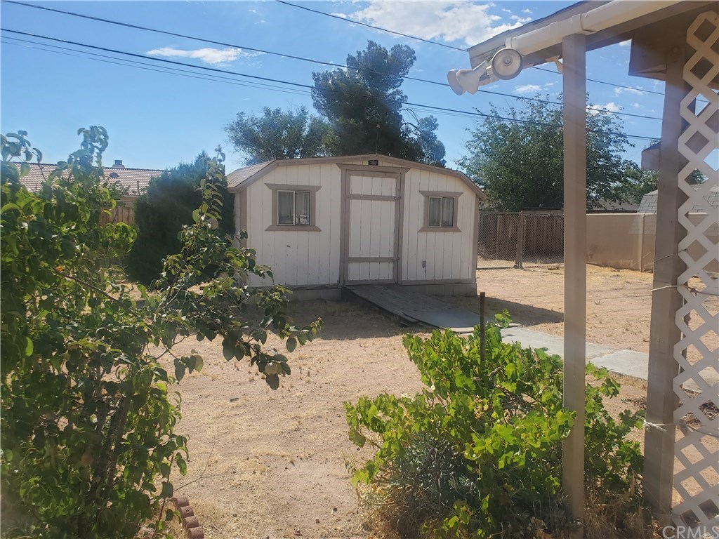 13020 Pawnee Road Apple Valley, CA 92308 - Photo 5 of 14 Wood shed back yard