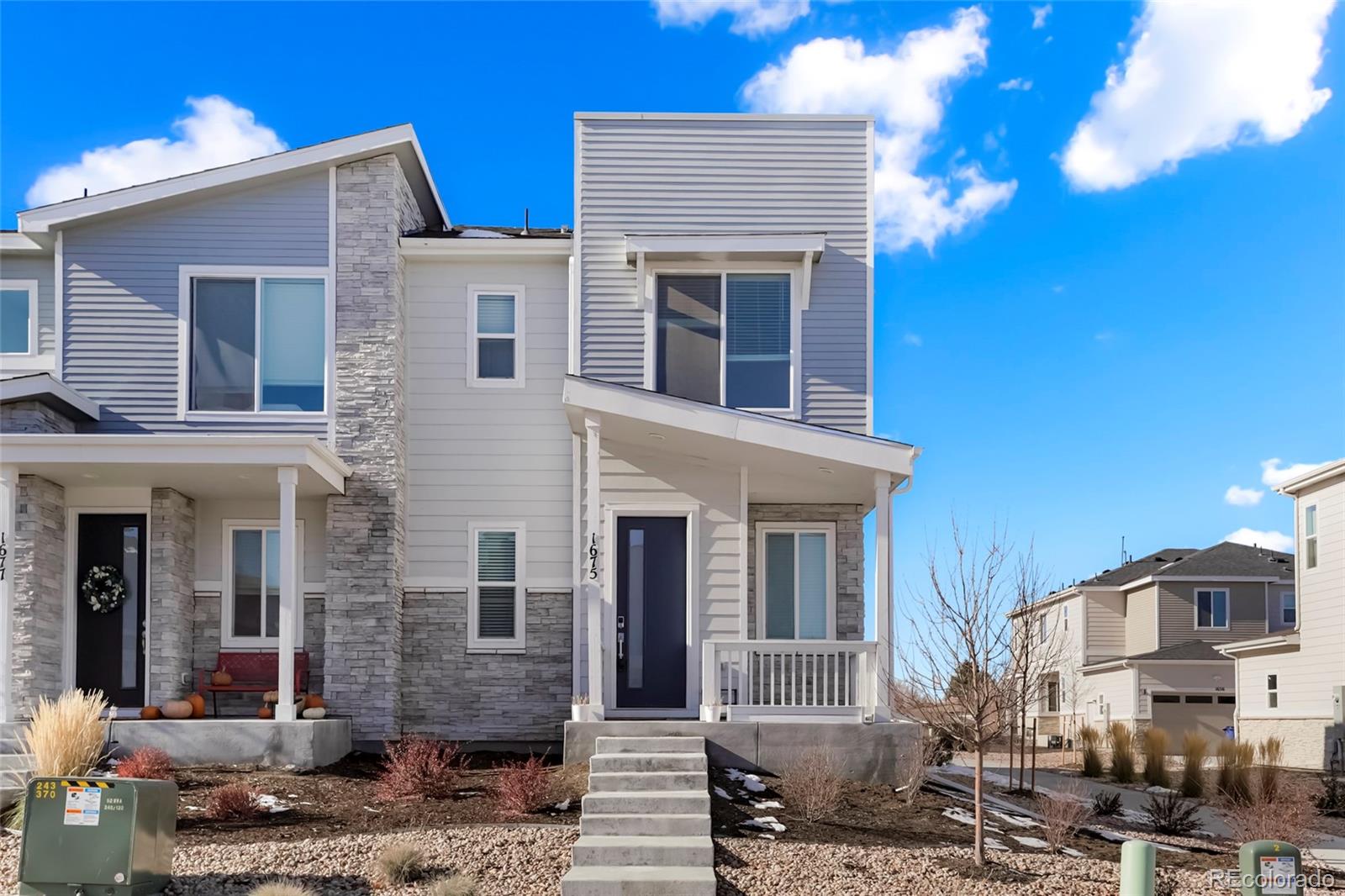 1675 South Andes Way Aurora, CO 80017 - Photo 2 of 32 a front view of a building