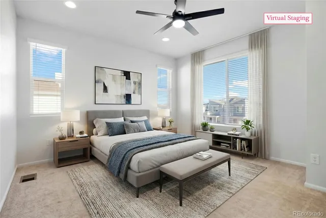 a bedroom with a bed and a table