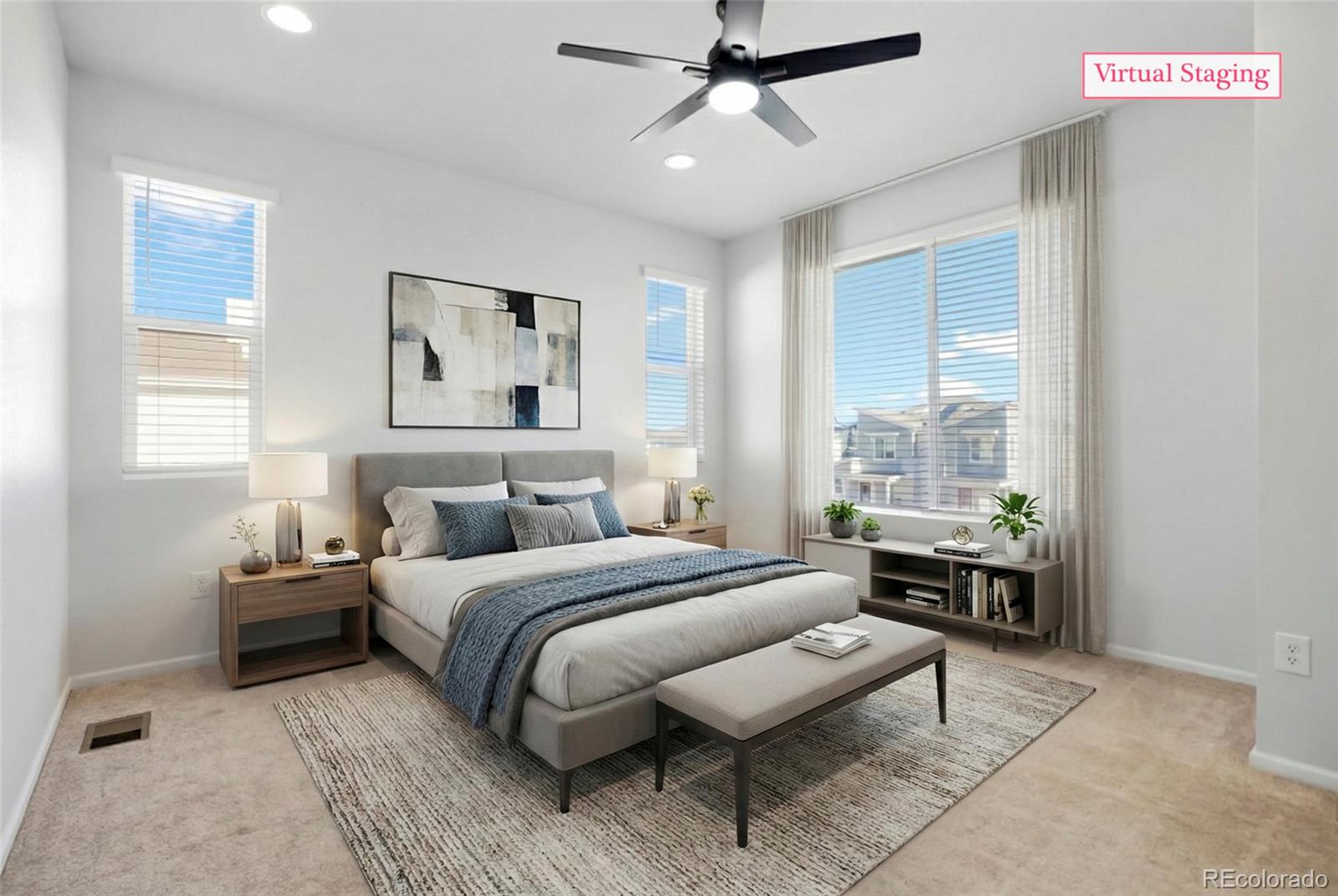 1675 South Andes Way Aurora, CO 80017 - Photo 21 of 32 a bedroom with a bed and a table