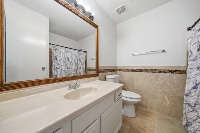 a bathroom with a sink and a toilet