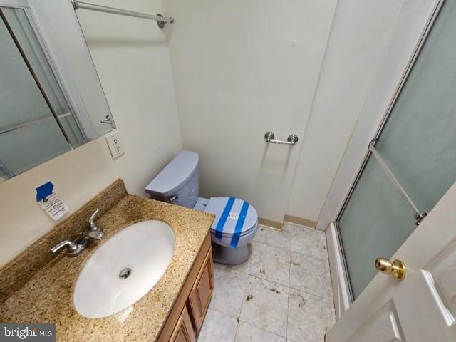 8509 Temple Road Philadelphia, PA 19150 - Photo 14 of 16 a bathroom with a tub and toilet
