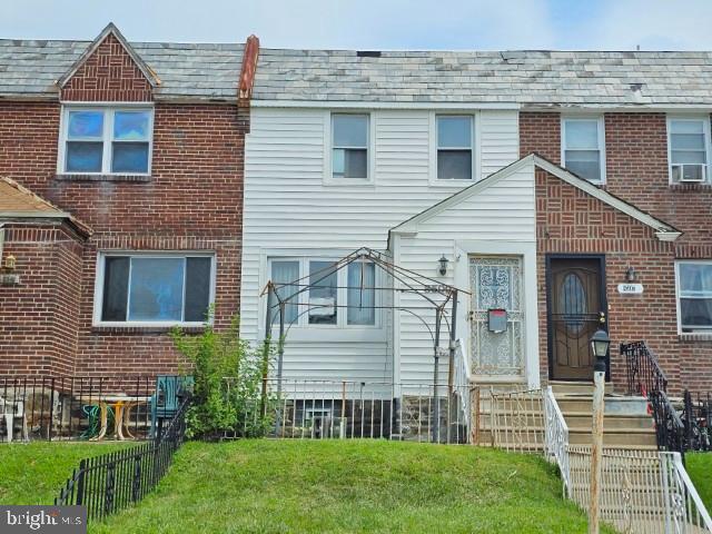8509 Temple Road Philadelphia, PA 19150 - Photo 2 of 16 a view of a house with a yard