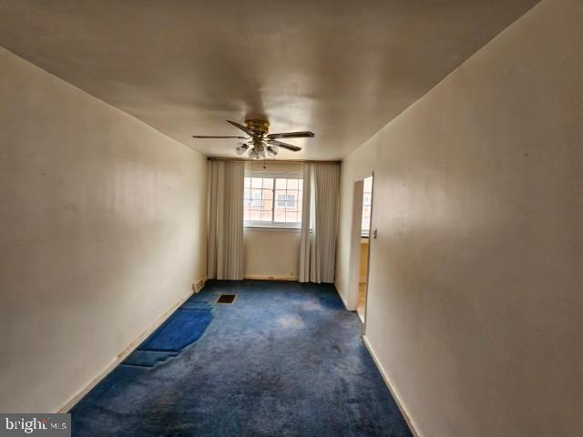 8509 Temple Road Philadelphia, PA 19150 - Photo 5 of 16 a view of an empty room with a window