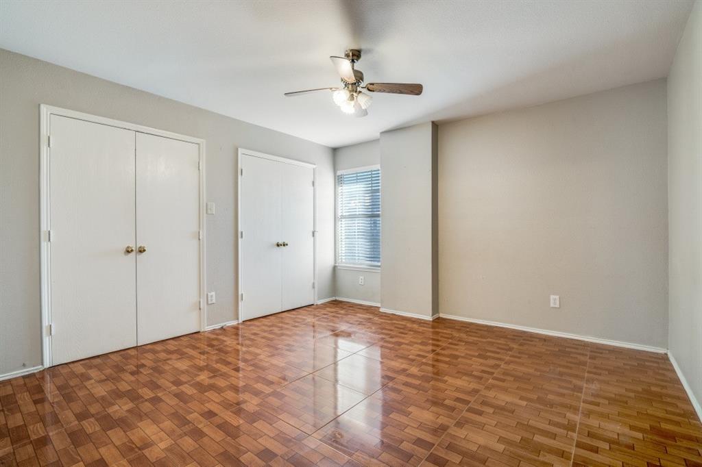 3817 Brandon Park Drive Garland, TX 75044 - Photo 10 of 11 a view of a room with a ceiling fan
