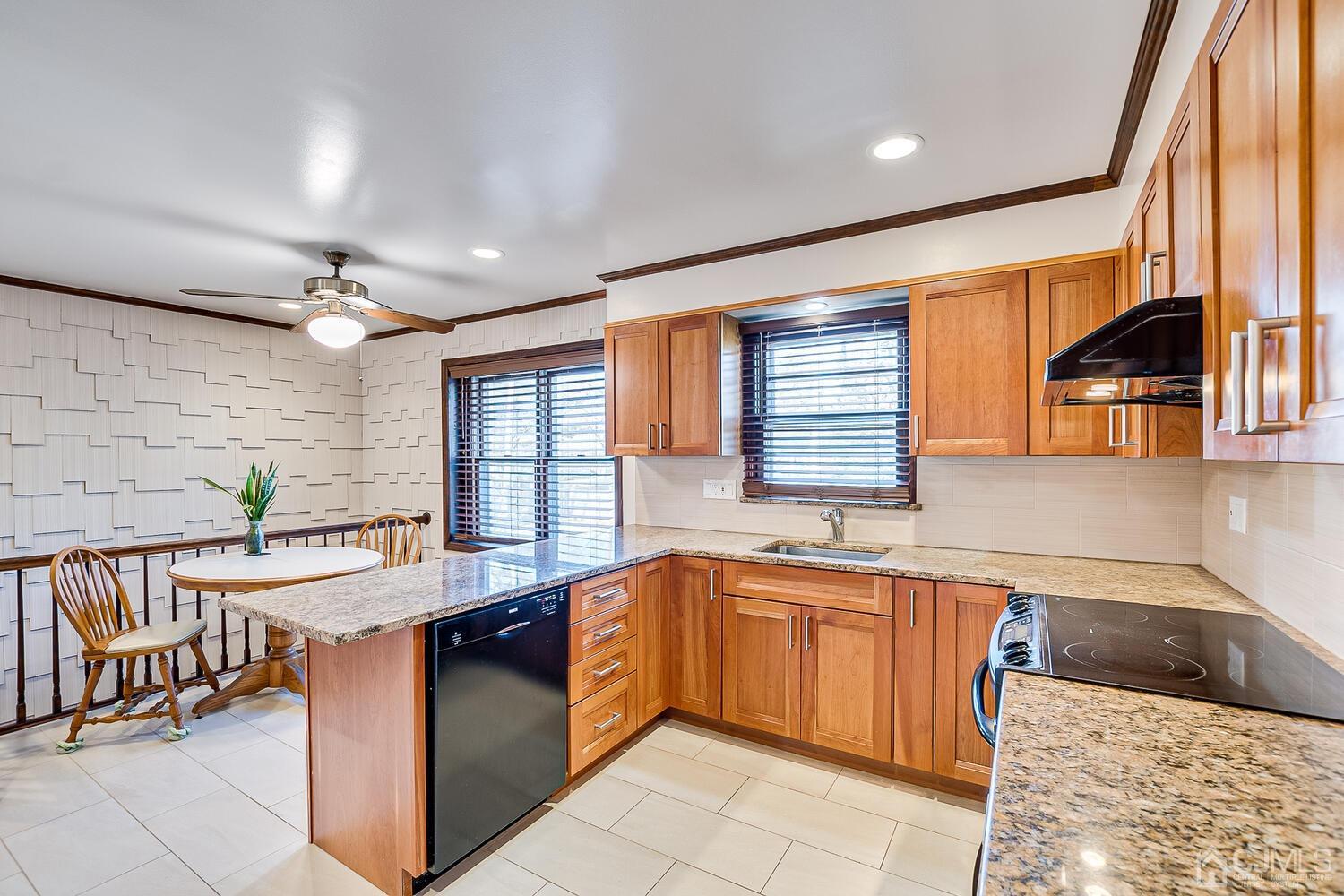 41 Clive Hills Road Edison, NJ 08820 - Photo 14 of 39 a kitchen with a sink stove and cabinets