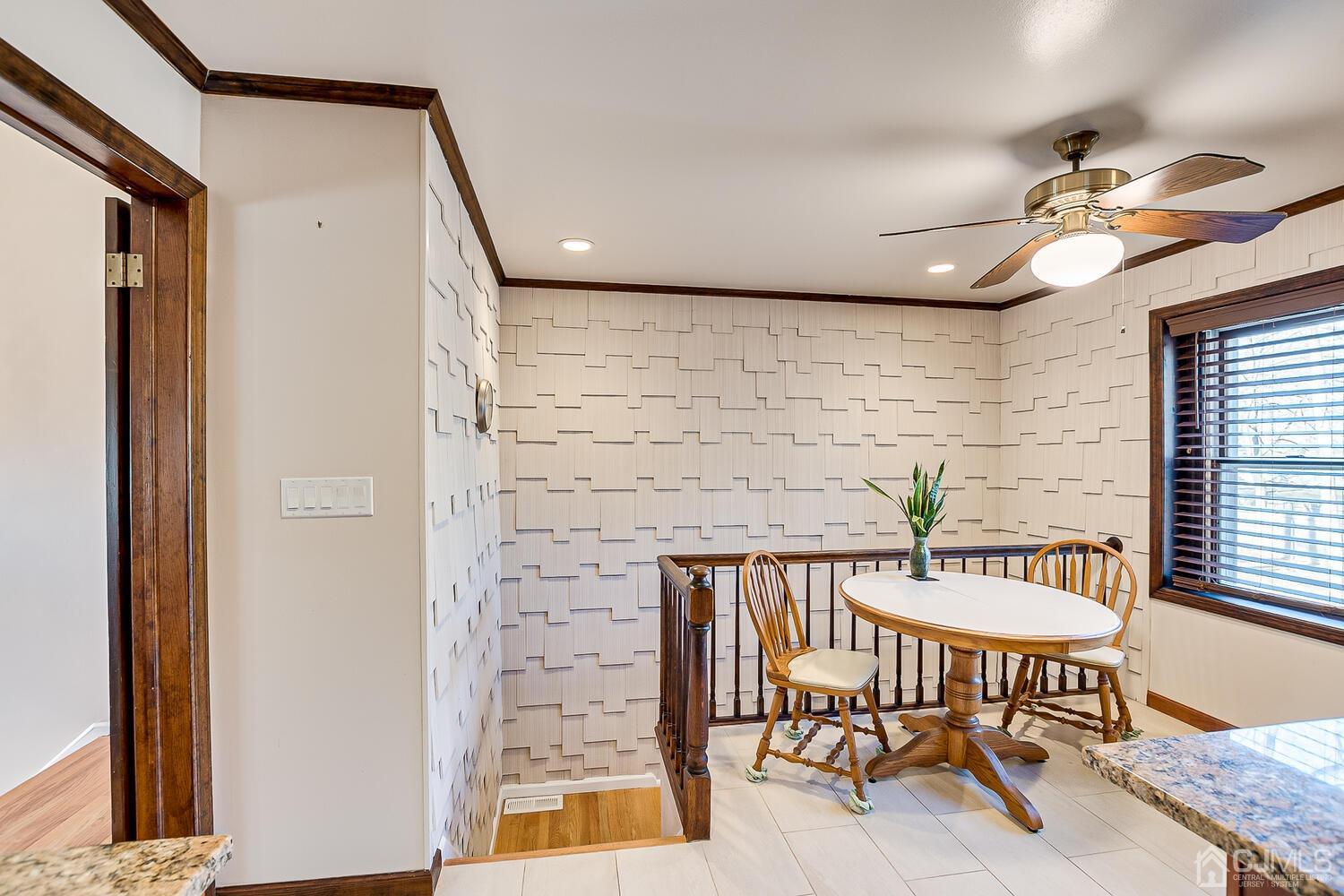 41 Clive Hills Road Edison, NJ 08820 - Photo 16 of 39 a dining room with furniture and wooden floor