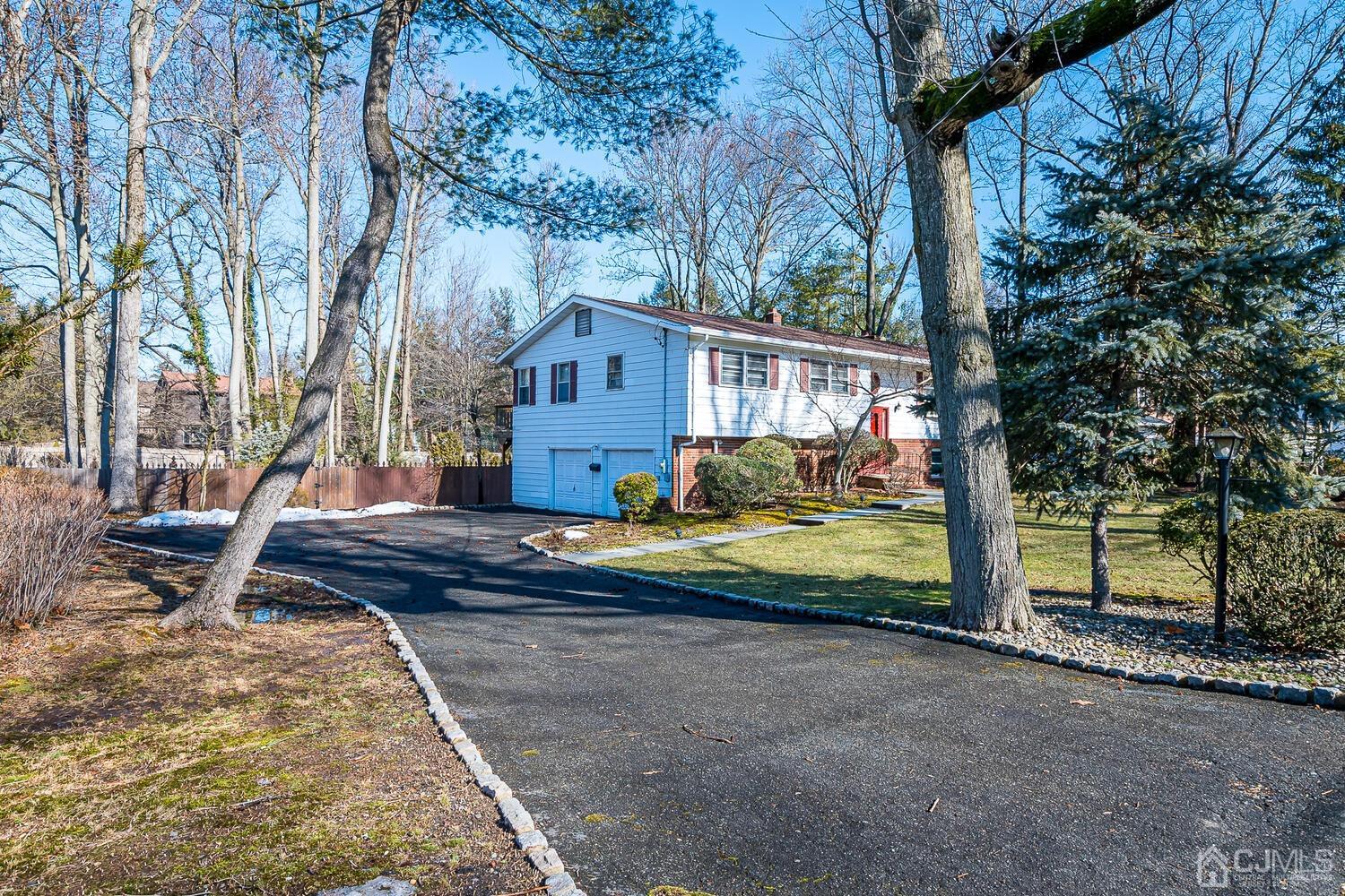 41 Clive Hills Road Edison, NJ 08820 - Photo 2 of 39 a view of a house with backyard and trees