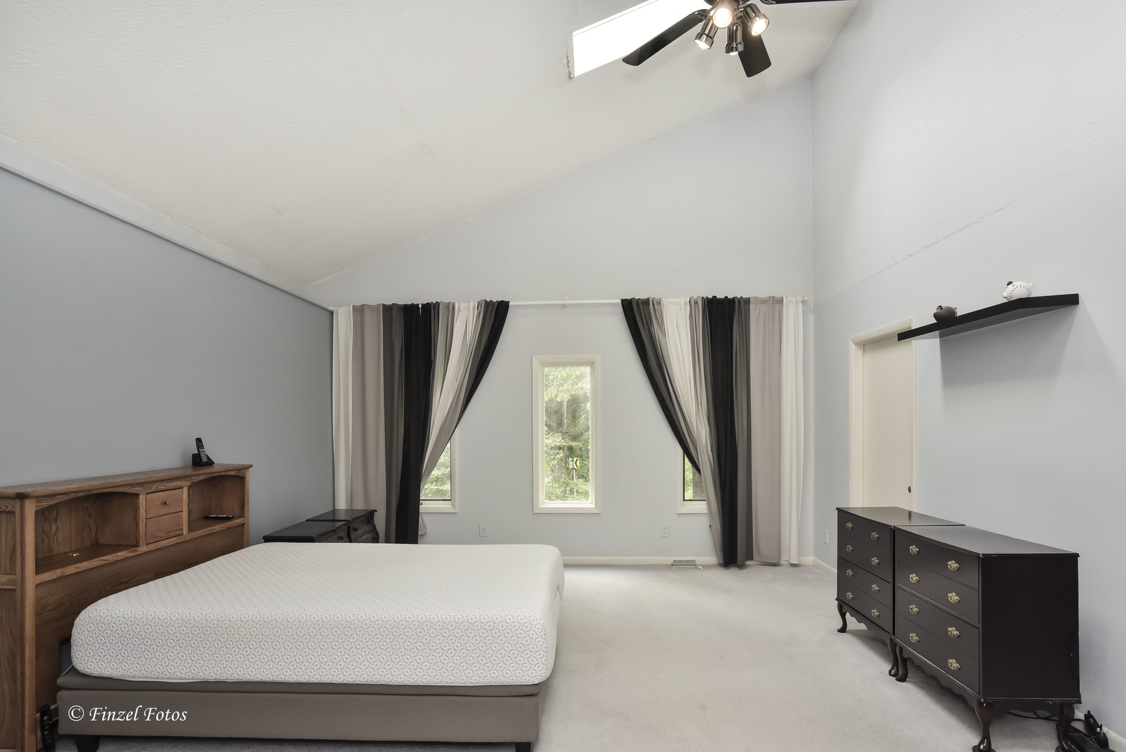 1817 Orchard Lane McHenry, IL 60050 - Photo 11 of 20 a bedroom with a bed and a dresser