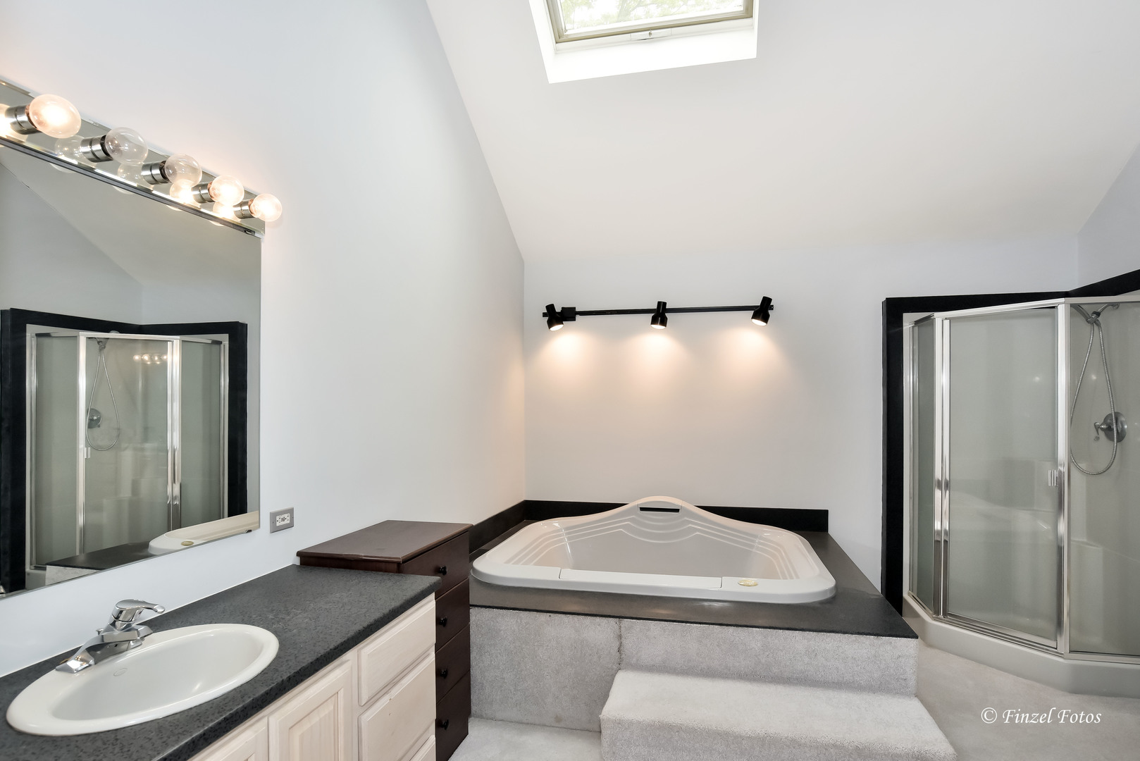 1817 Orchard Lane McHenry, IL 60050 - Photo 12 of 20 a bathroom with a sink and a mirror