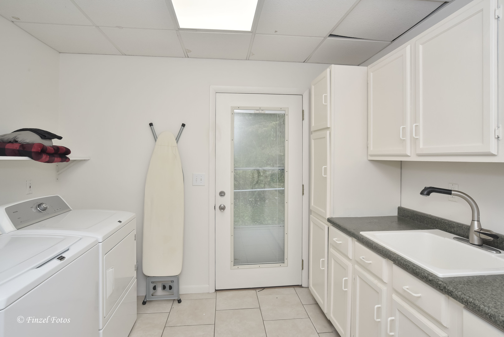 1817 Orchard Lane McHenry, IL 60050 - Photo 17 of 20 a bathroom with a sink and a mirror
