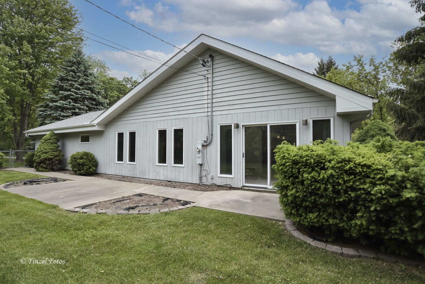 1817 Orchard Lane McHenry, IL 60050 - Photo 19 of 20 a front view of house with yard and green space